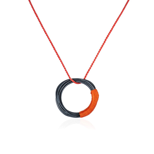 Wrapped Orange Oxidised Pendant on Orange Silk Cord
